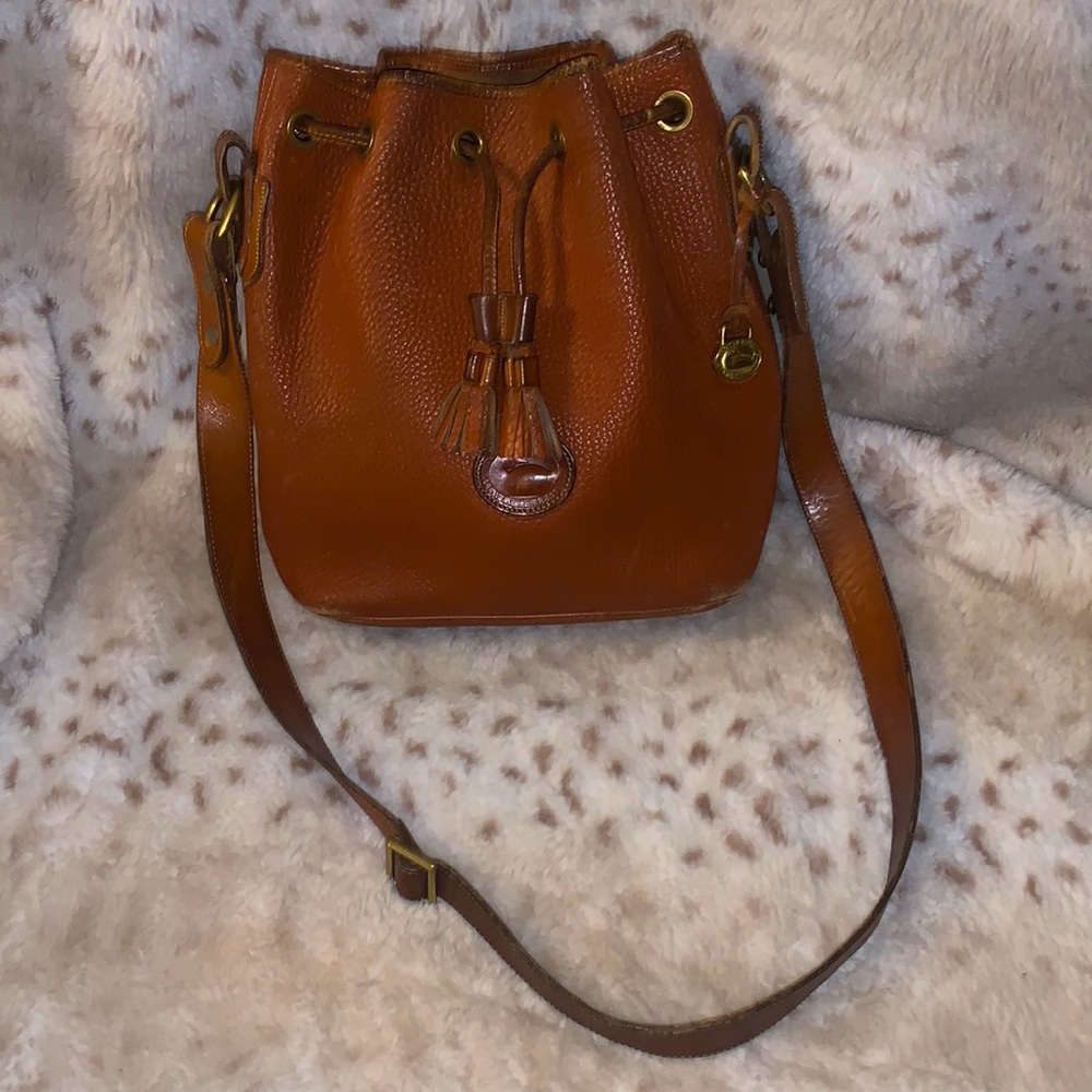 Absolute bottom $ Dooney & Bourke all Leather crossbody Bucket Bag Cameral color